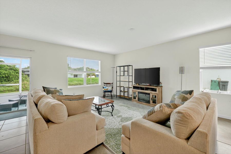Furnished interior view inside a new home in , Port St. Lucie (Image 11).