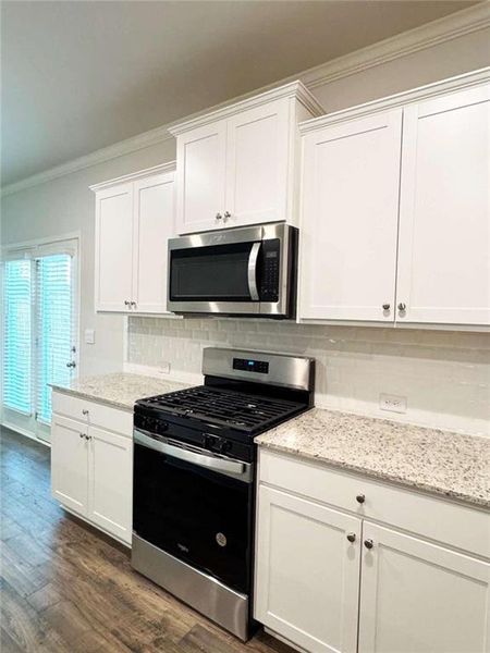 Furnished interior view inside a new home in , Buford (Image 10).