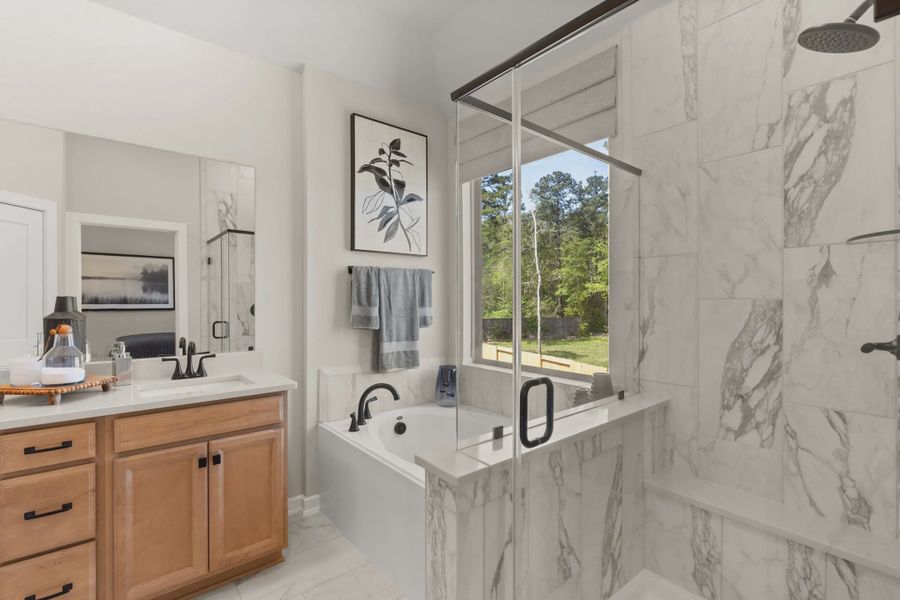 Representative furnished interior of a home built from the Chantilly by Chesmar Homes in The Woodland Hills Chateau, Willis (Image 10).