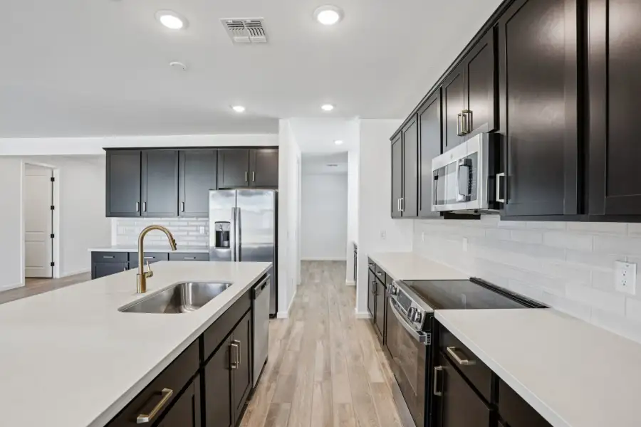 Kitchen - Sanctuary at Stonebridge Model Home. Finishes and options may vary by community