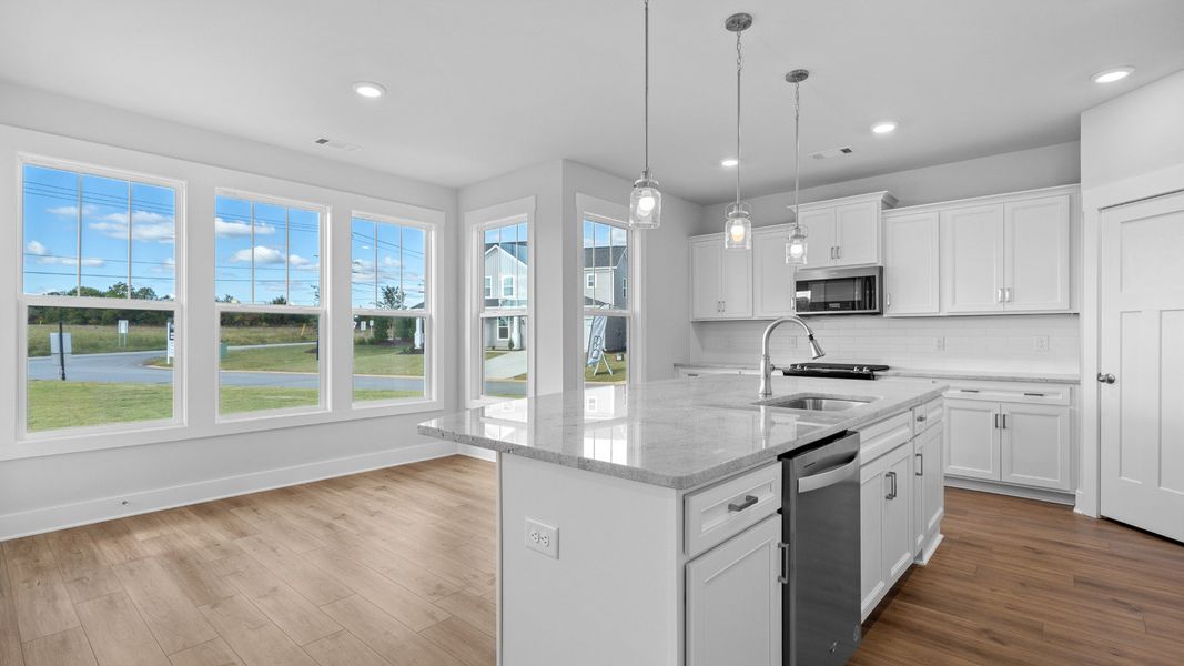 2 story single family home, all white, kitchen