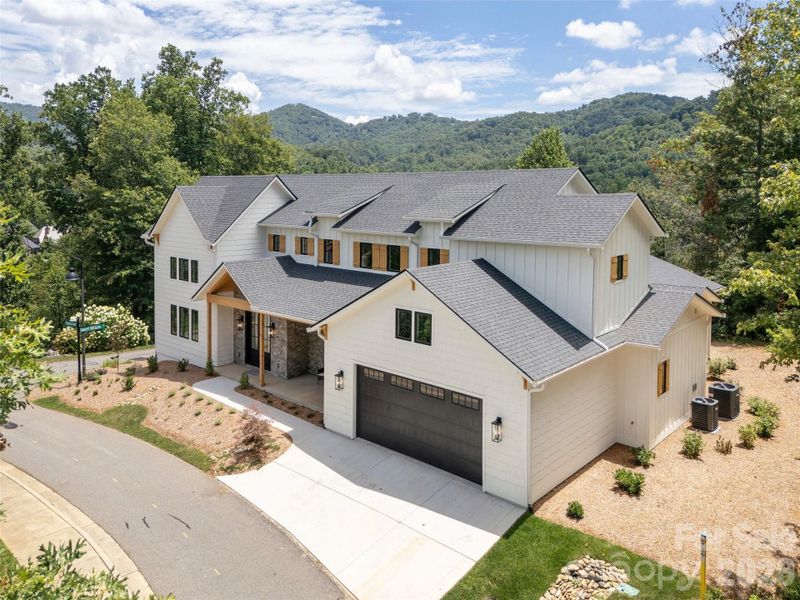 Front exterior of a new home in , Asheville, NC, highlighting curb appeal (Image 26).