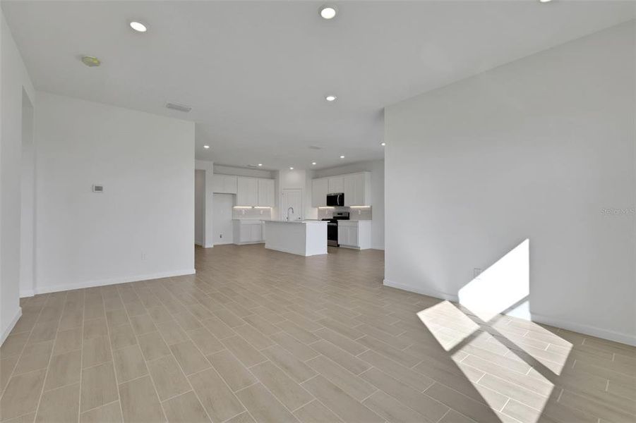 Spacious, unfurnished interior of a new home in Brystol North at Wylder, Port St. Lucie (Image 25).