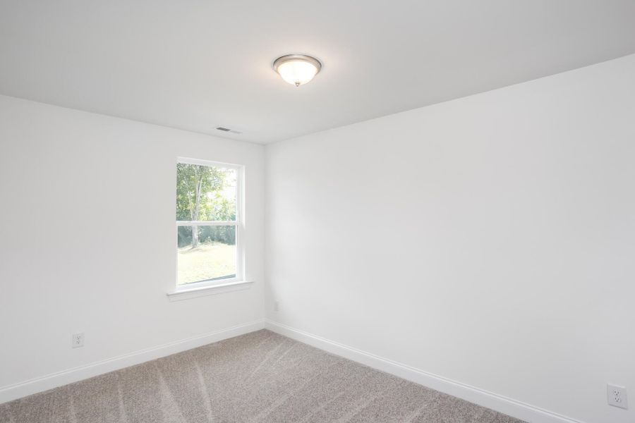 Spacious, unfurnished interior of a new home in Enclave at Traditions Townhomes, Wake Forest (Image 14).