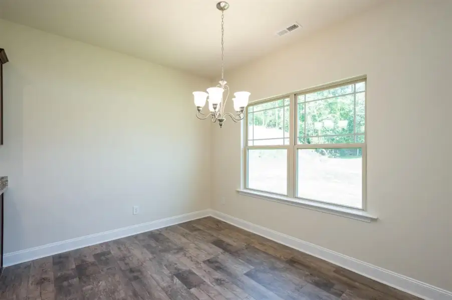 Representative unfurnished interior of a home built from the 1602-2 by Adams Homes in Ham Farm, La Grange (Image 18).