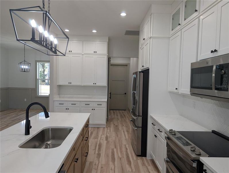 Furnished interior view inside a new home in , Ocala (Image 9).