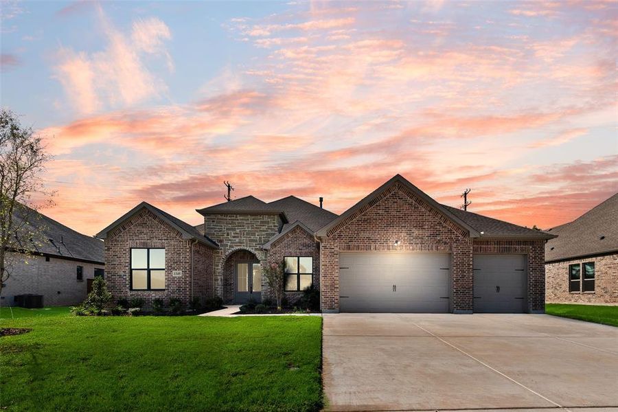 Front exterior of a new home in Lincoln Pointe, Van Alstyne, TX, highlighting curb appeal (Image 22). Front exterior of a new home in Lincoln Pointe, Van Alstyne, TX, highlighting curb appeal (Image 22).