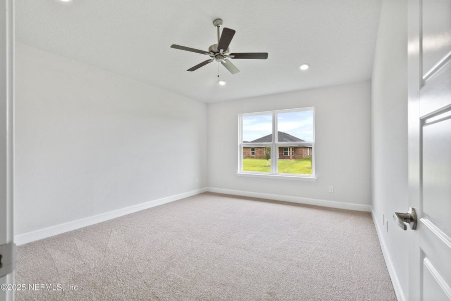 Spacious, unfurnished interior of a new home in Shadow Crest at Rolling Hills, Green Cove Springs (Image 14).