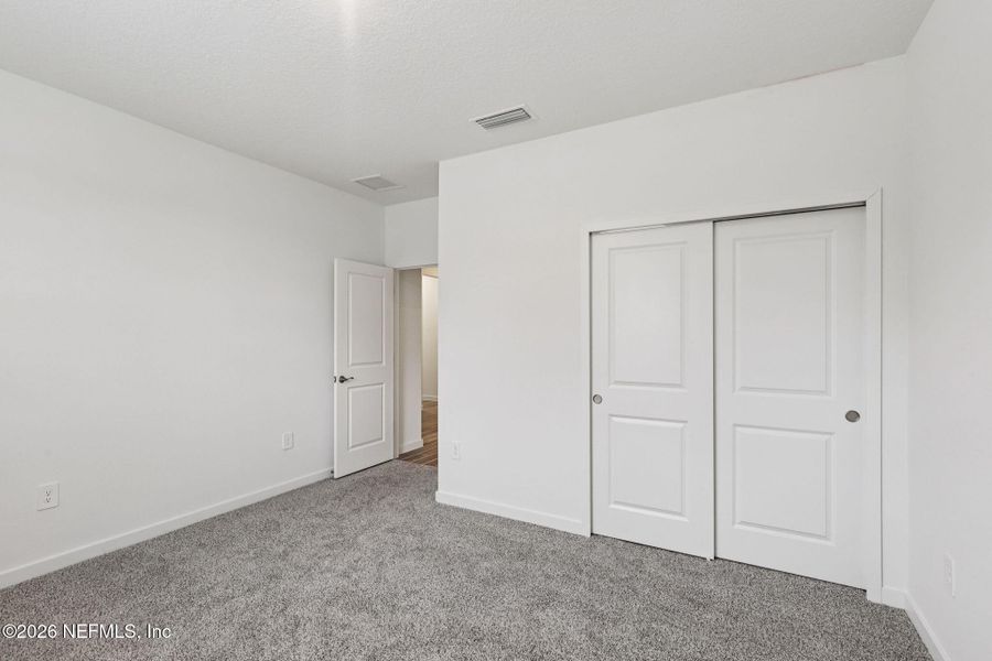 Spacious, unfurnished interior of a new home in Flagler Village - Signature Series, Palm Coast (Image 10). Spacious, unfurnished interior of a new home in Flagler Village - Signature Series, Palm Coast (Image 10).