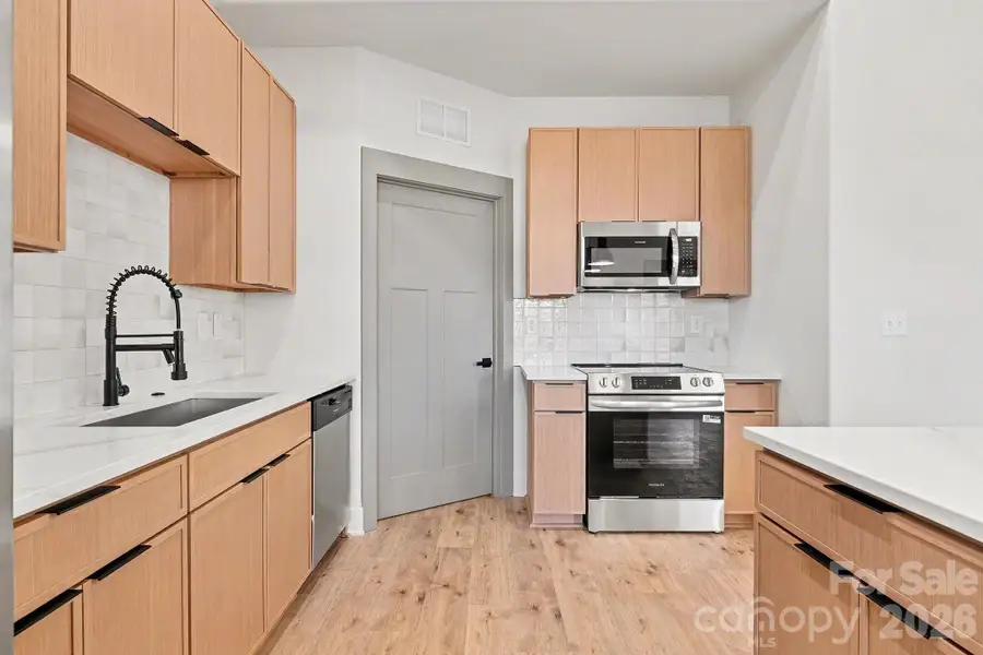 Furnished interior view inside a new home in , Concord (Image 7).