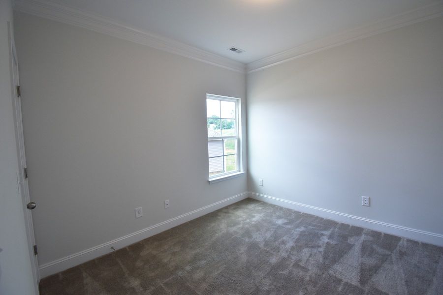 Representative unfurnished interior of a home built from the Ellerbe by Keystone Homes NC in Sullivans Reserve, Walkertown (Image 30).