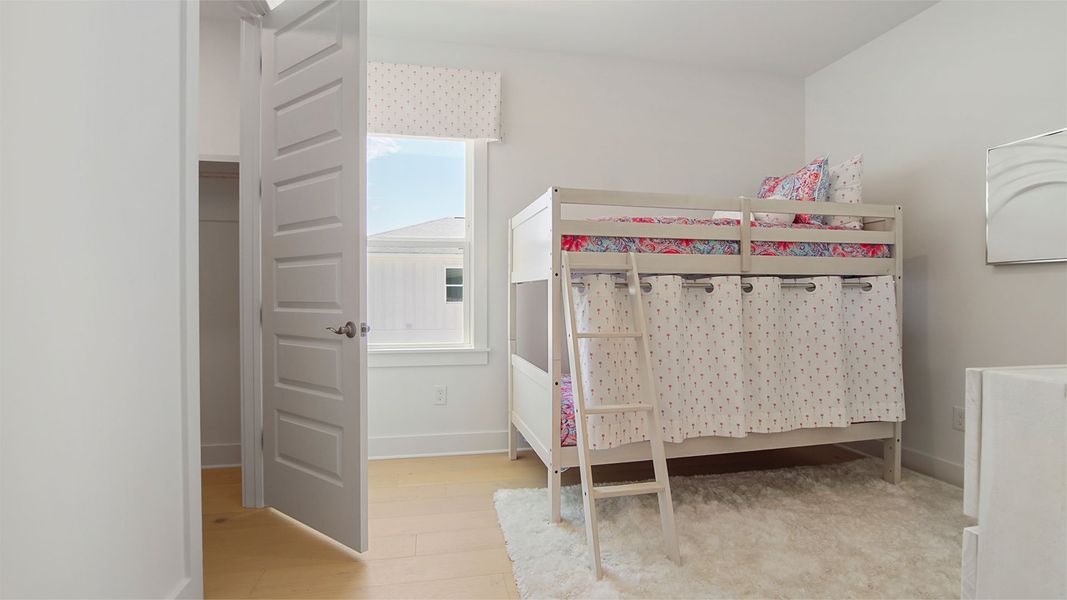 Representative furnished interior of a home built from the Brayden by D.R. Horton in Parkside, Santa Rosa Beach (Image 43).
