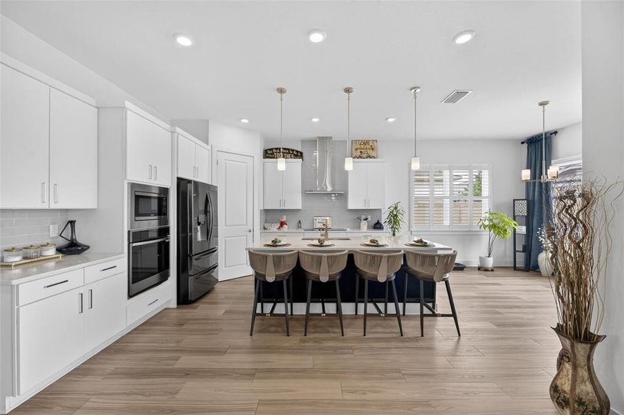 Furnished interior view inside a new home in Robin's Cove at Epperson, Wesley Chapel (Image 13).