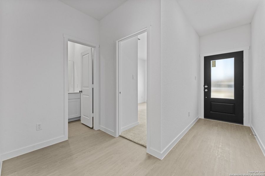 Spacious, unfurnished interior of a new home in Waterwheel: Coastline Collection, San Antonio (Image 11).