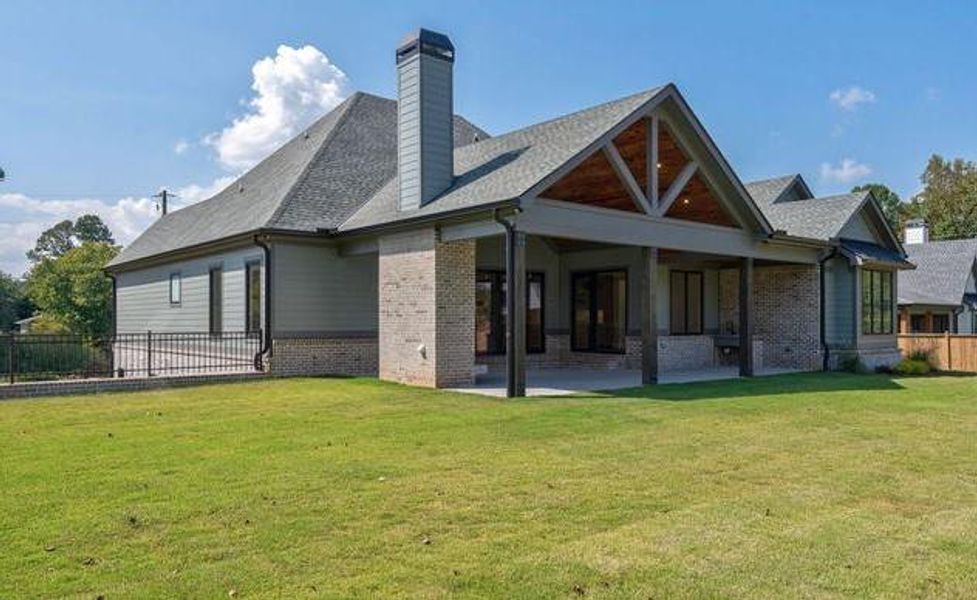 Front exterior of a new home in , Cumming, GA, highlighting curb appeal (Image 36).
