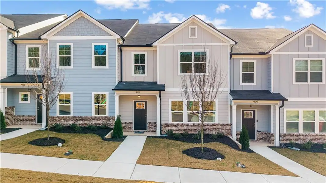 Front exterior of a new home in , Conyers, GA, highlighting curb appeal (Image 25).