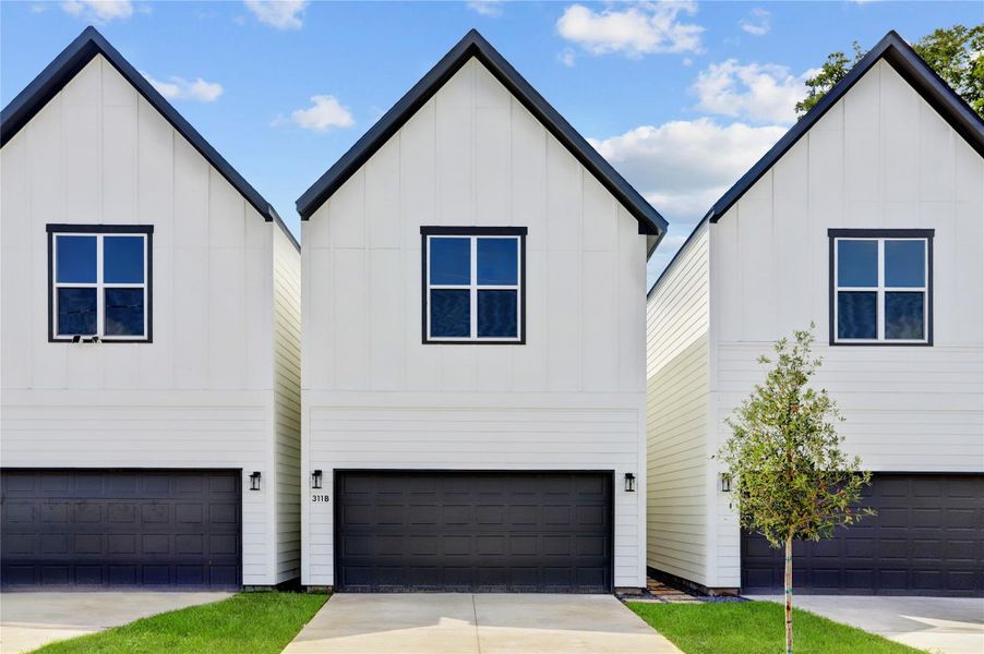 Each home has 2 car garage, long double wide driveway and sprinklers front and back. Oversized 21' X 18.5' garage fits 2 F-150s! Each home has 2 car garage, long double wide driveway and sprinklers front and back. Oversized 21' X 18.5' garage fits 2 F-150s!