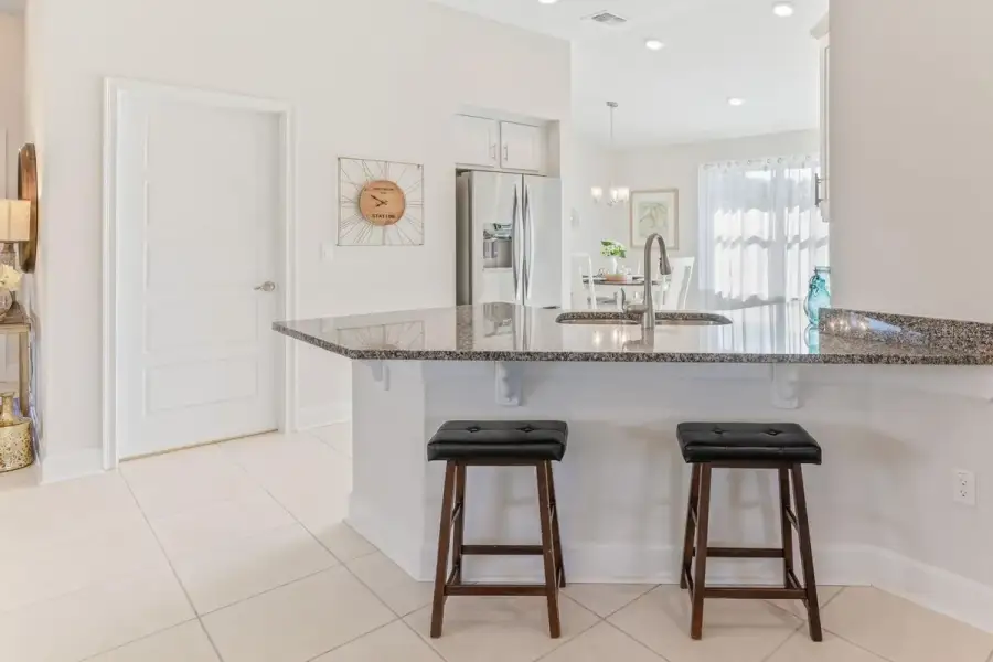 Representative furnished interior of a home built from the 1820 by Adams Homes in Flagler Estates, Hastings (Image 8).