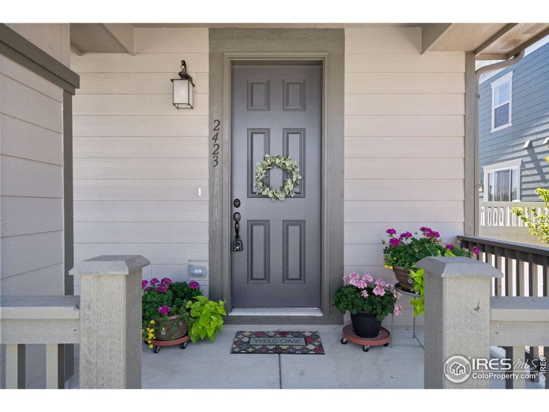 Front Porch Offers Perfect Retreat Space & a Great Area For Plants