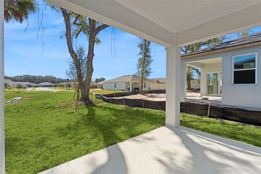 Exterior details and patio area of a home in Estes Reserve, Eustis (Image 13).