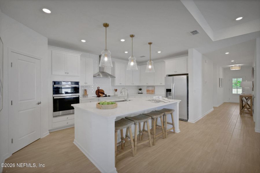 Furnished interior view inside a new home in Seminole Trace, Palm Coast (Image 49).