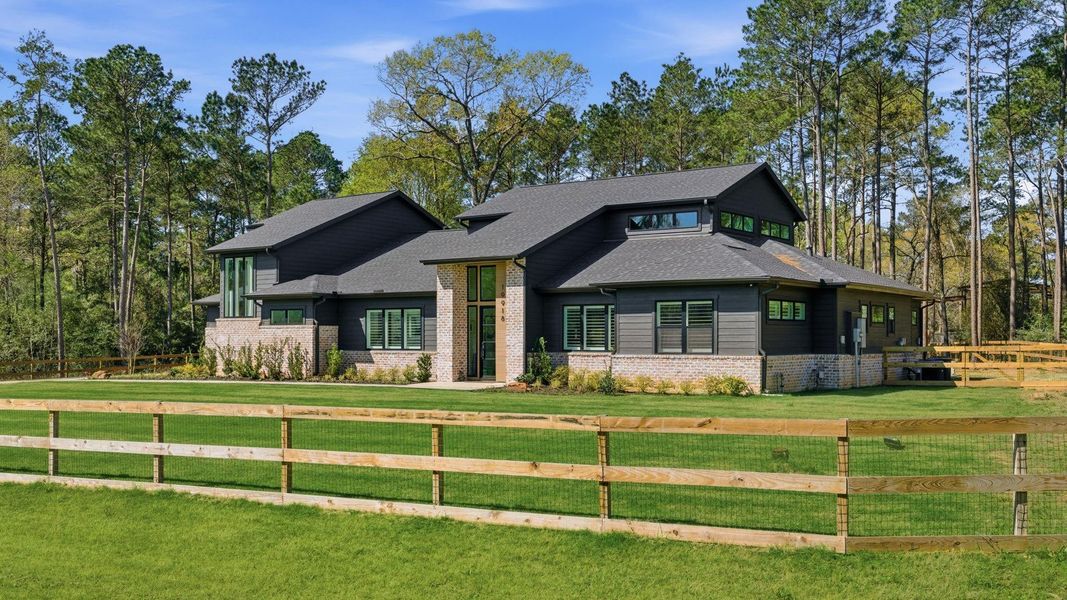 Front exterior of a new home in , Magnolia, TX, highlighting curb appeal (Image 23).