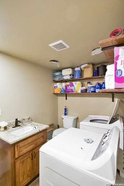 Furnished interior view inside a new home in , Beeville (Image 8).