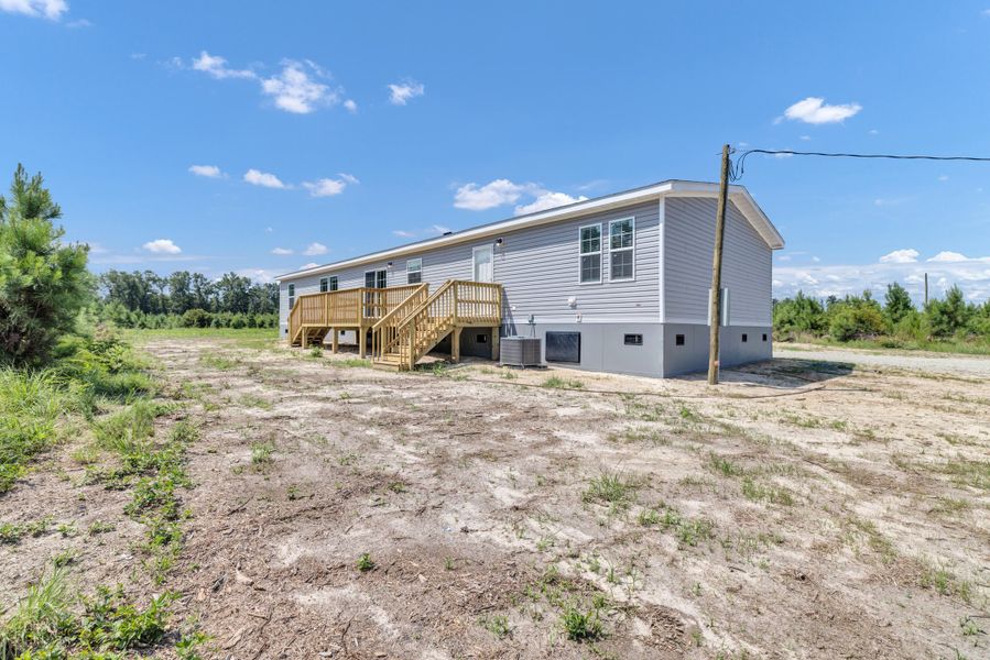 Front exterior of a new home in , Cross, SC, highlighting curb appeal (Image 24).