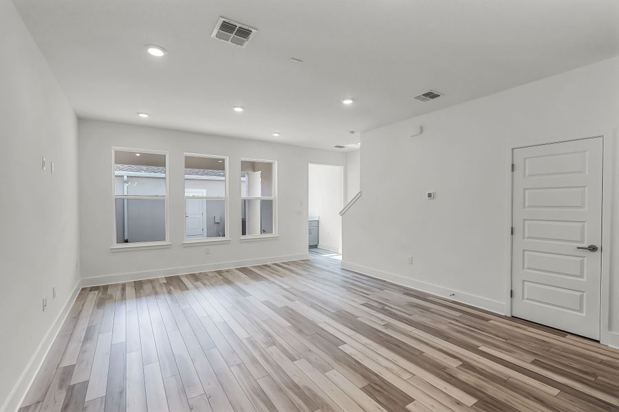 Representative unfurnished interior of a home built from the Newton by Rockwell Homes in Harvest at Ovation - Townhomes, Winter Garden (Image 65). Representative unfurnished interior of a home built from the Newton by Rockwell Homes in Harvest at Ovation - Townhomes, Winter Garden (Image 65).