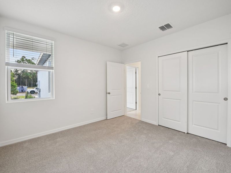 Spacious, unfurnished interior of a new home in Ridgehaven - Villas, Ormond Beach (Image 9).