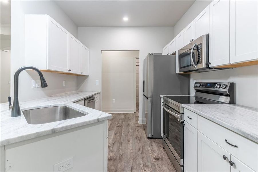 Furnished interior view inside a new home in , Commerce (Image 18).