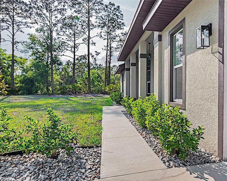 Front exterior of a new home in , Palm Coast, FL, highlighting curb appeal (Image 1).