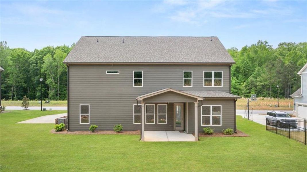 Exterior details and patio area of a home in Traditions of Braselton, Jefferson (Image 3).