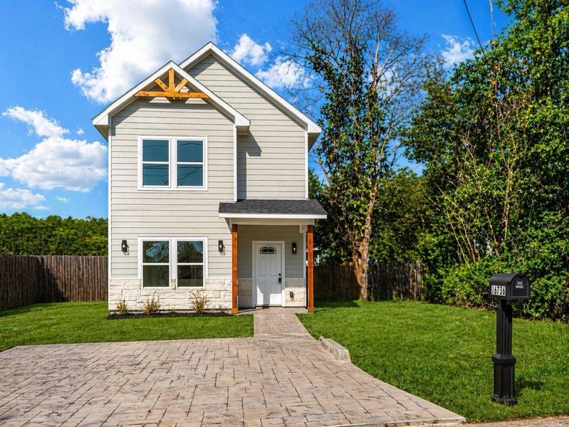 Front exterior of a new home in , Montgomery, TX, highlighting curb appeal (Image 2). Front exterior of a new home in , Montgomery, TX, highlighting curb appeal (Image 2).