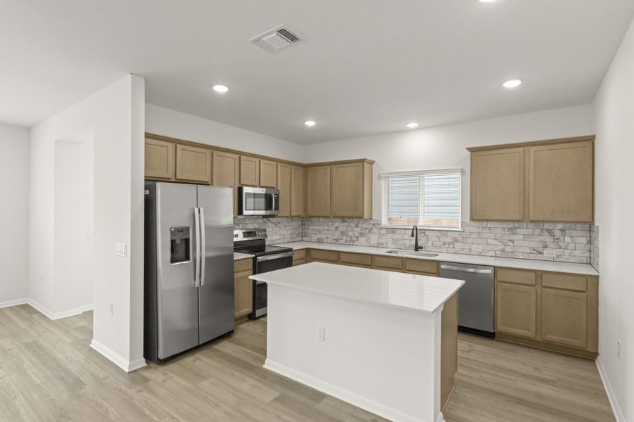 Furnished interior view inside a new home in Whisper Valley, Manor (Image 7).