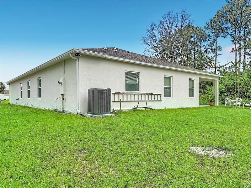 Exterior details and patio area of a home in Palm Bay, Palm Bay (Image 31).
