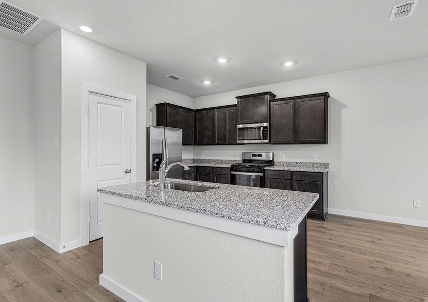 The kitchen has beautiful wood cabinetry. The kitchen has beautiful wood cabinetry.