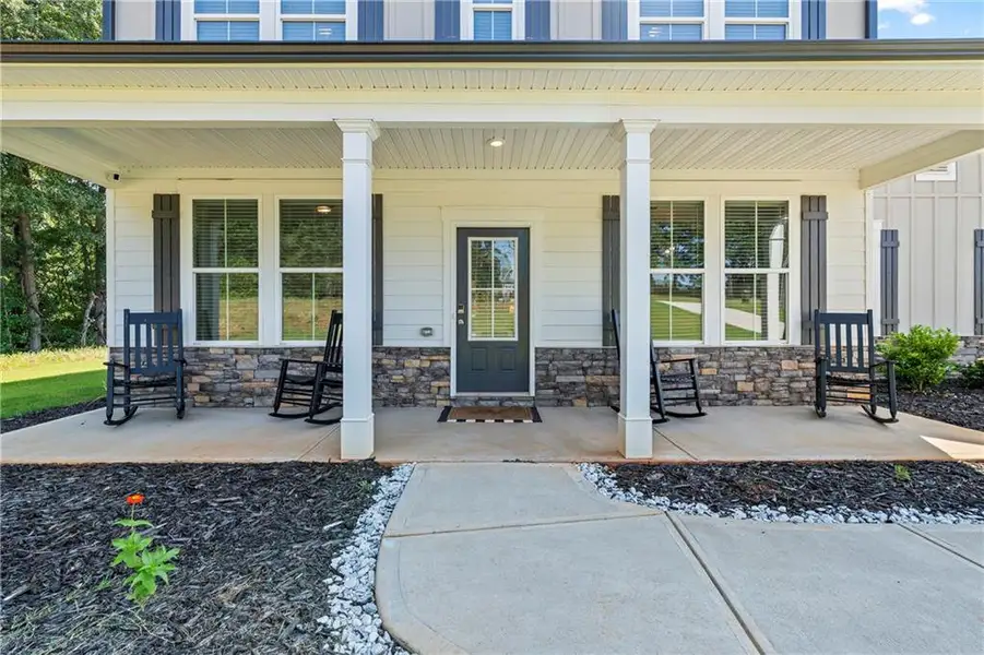Exterior details and patio area of a home in Crossing Creeks, Monroe (Image 3). Exterior details and patio area of a home in Crossing Creeks, Monroe (Image 3).