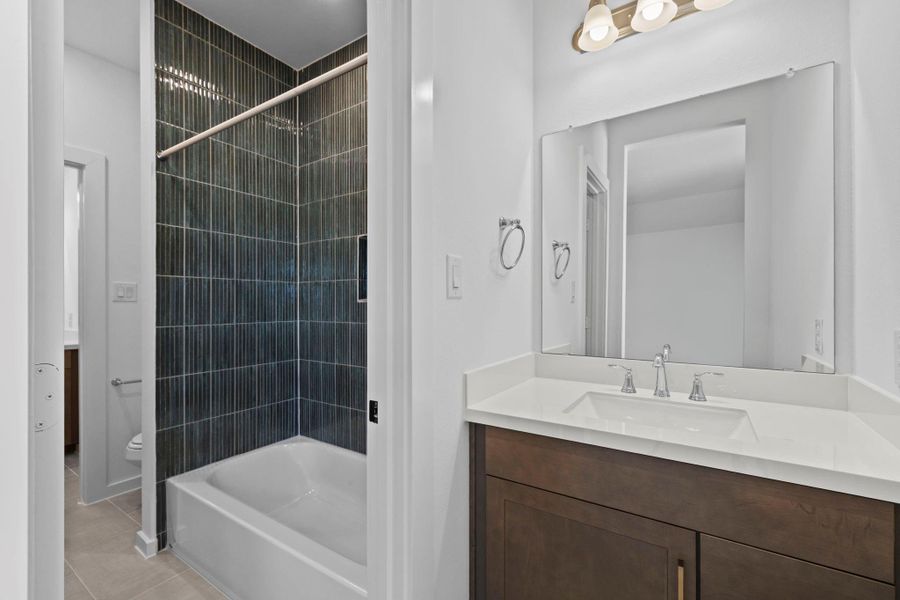 Furnished interior view inside a new home in Sienna Village of Anderson Springs 50', Missouri City (Image 6).