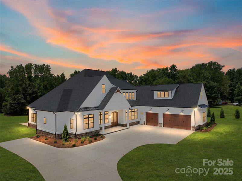 Concept Twilight photo of new construction home with grass! Concept Twilight photo of new construction home with grass!