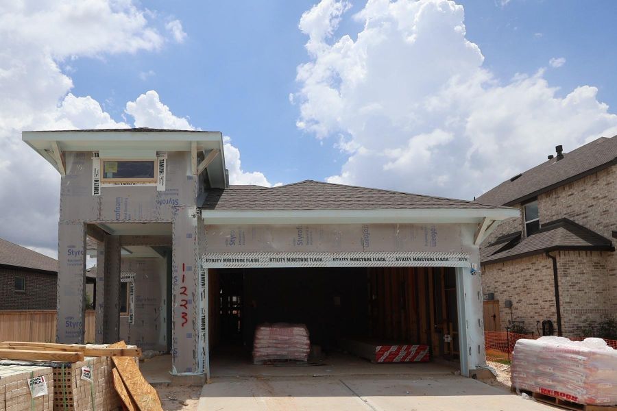 In-progress construction of a new home in Prairieland Village - Grove Collection, Cypress, TX (Image 5). In-progress construction of a new home in Prairieland Village - Grove Collection, Cypress, TX (Image 5).