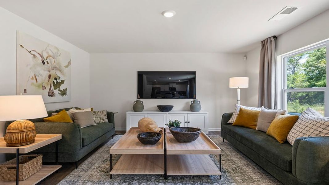 Representative furnished interior of a home built from the Belhaven by D.R. Horton in Rocky River Ridge, Anderson (Image 12).