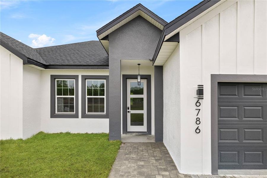 Exterior details and patio area of a home in , Ocala (Image 4).