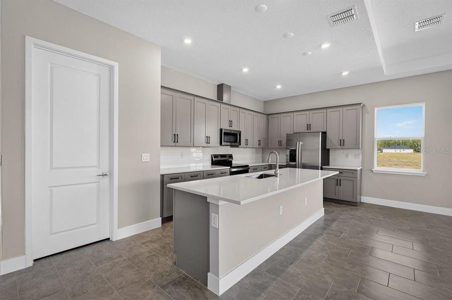 Furnished interior view inside a new home in Gray Hawk at Hole Two, Daytona Beach (Image 14).