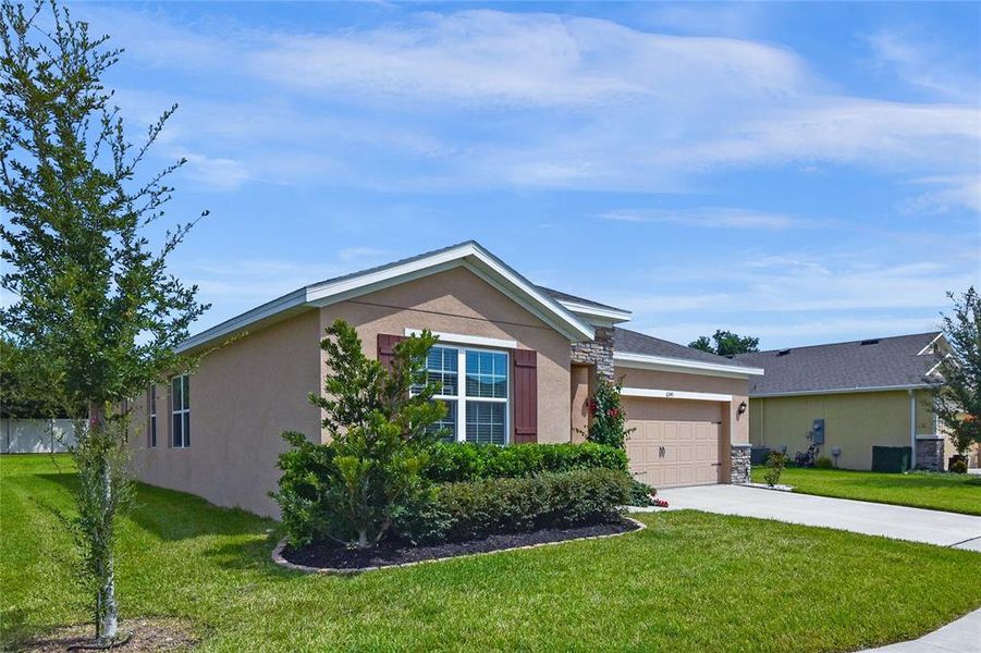 Front exterior of a new home in , Ocala, FL, highlighting curb appeal (Image 21).
