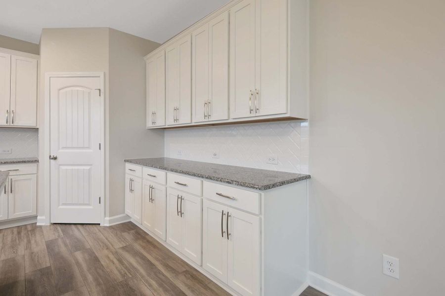 Representative furnished interior of a home built from the Drayton by Caviness & Cates Communities in Bartlett Manor, Youngsville (Image 182).