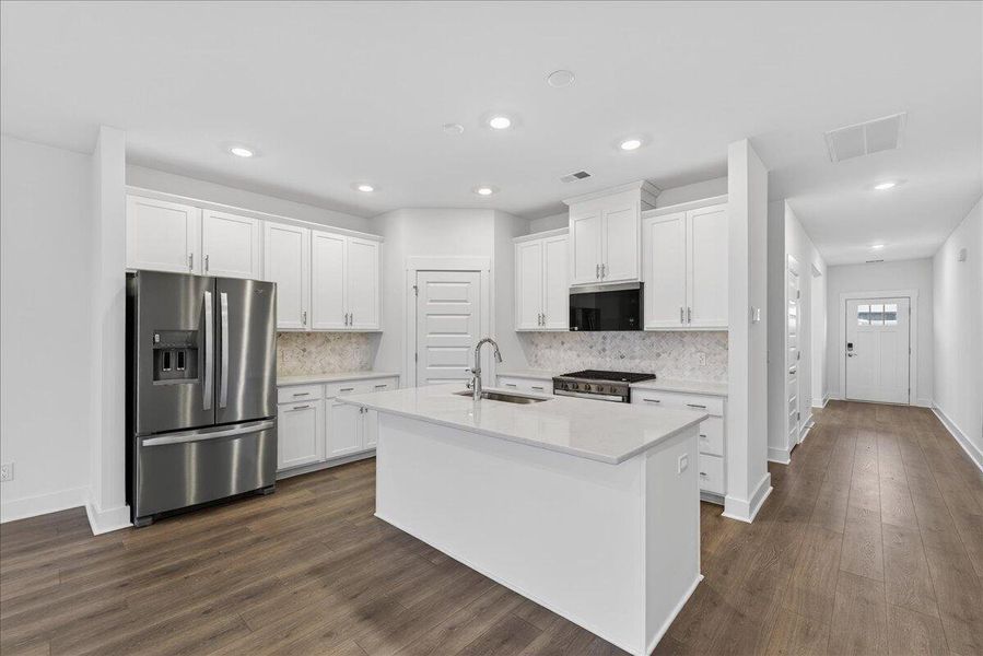 Furnished interior view inside a new home in The Coves at Lakes of Cane Bay, Summerville (Image 18).