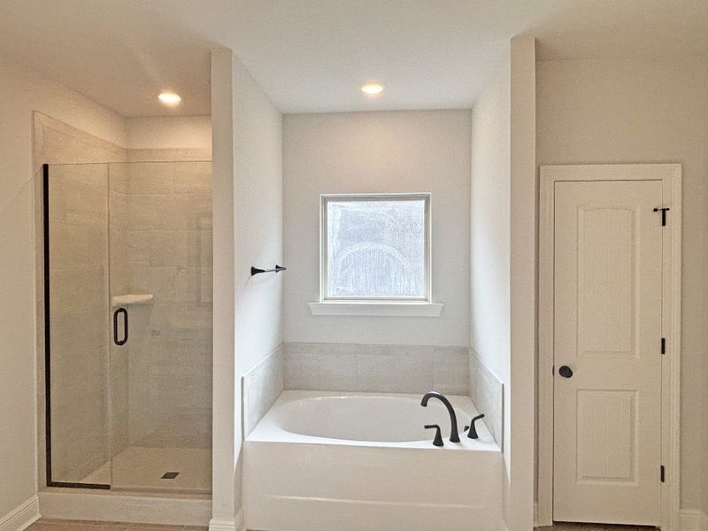 Furnished interior view inside a new home in Bird Song at Hammock Bay, Freeport (Image 11).