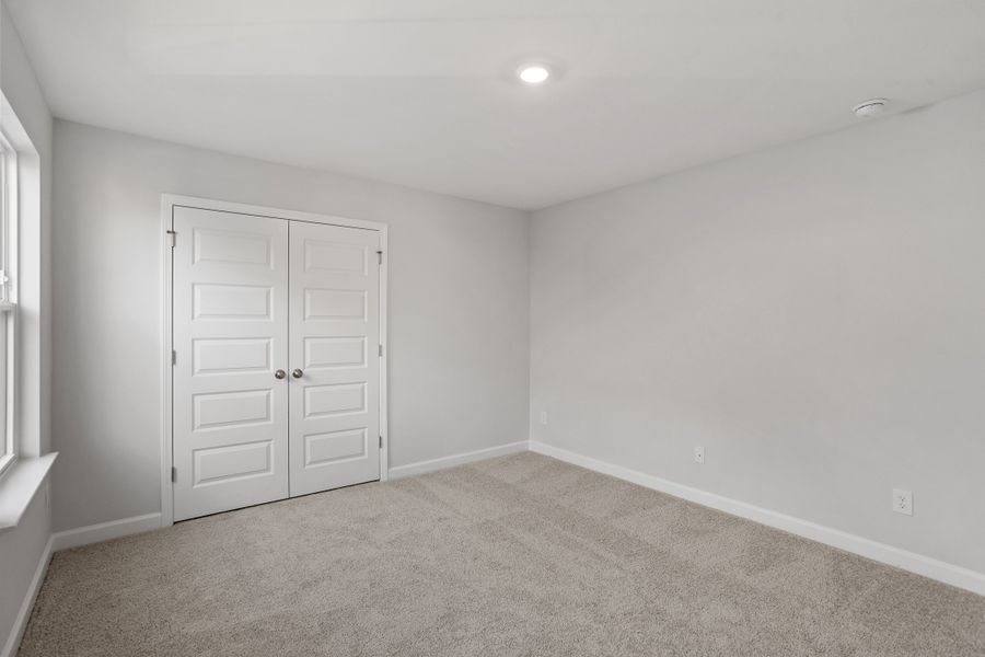 Spacious, unfurnished interior of a new home in Sweetbrier, Durham (Image 32).