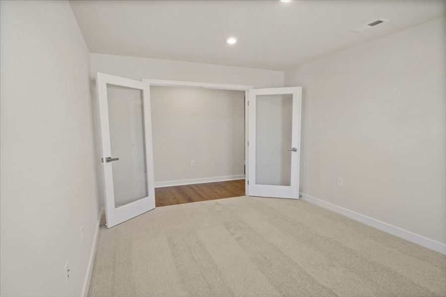 Spacious, unfurnished interior of a new home in Reidville Town Center Cottages, Duncan (Image 18).